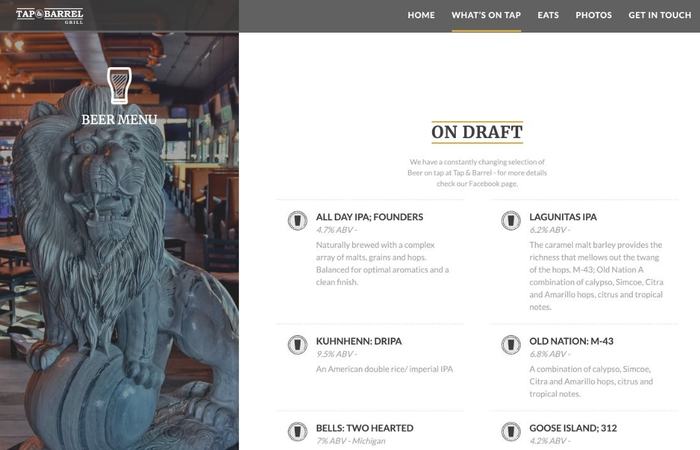 Tap & Barrel draft menu beside the lion statue.