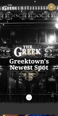 The The Greek website on a phone.